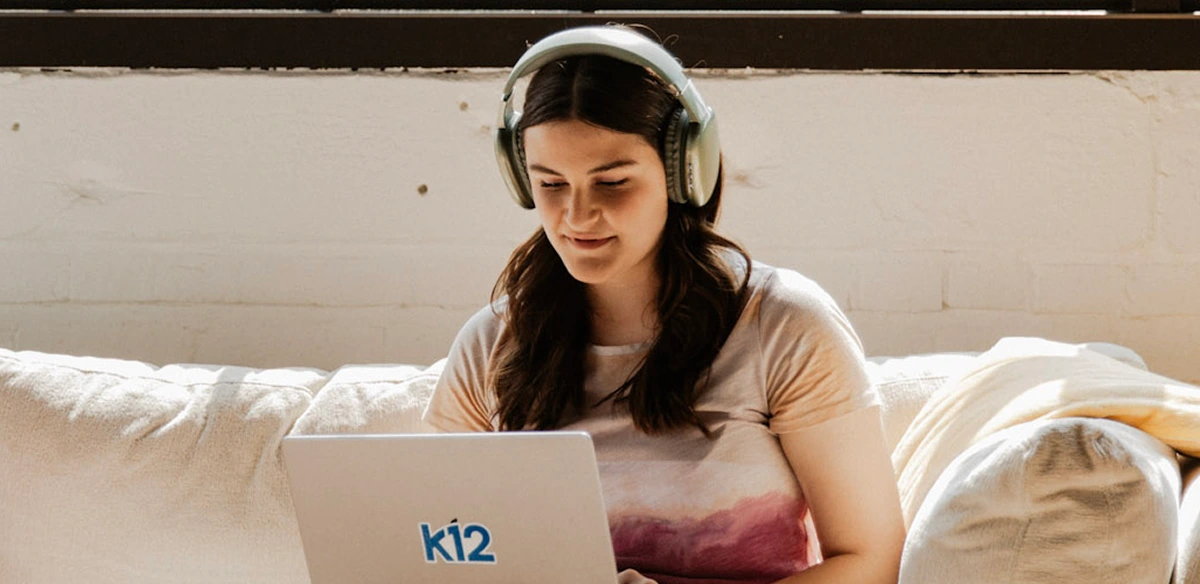 girl studying with headphones